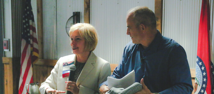 Ronda and Gary Pinkel presenting