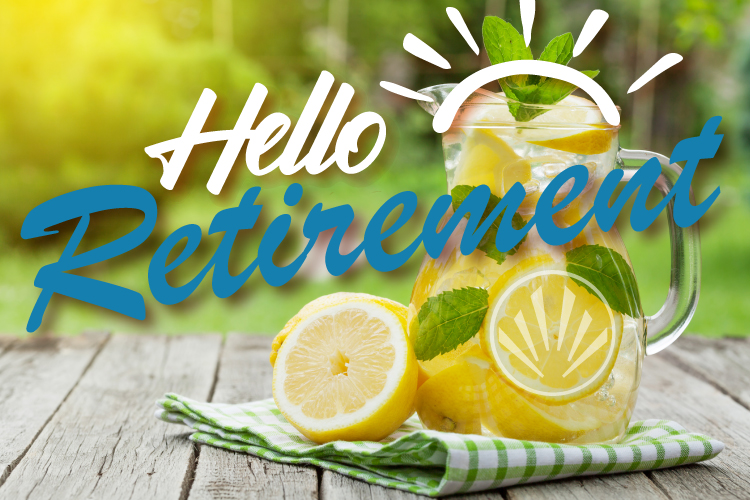 "Hello Retirement" over a pitcher of lemonade on a table.